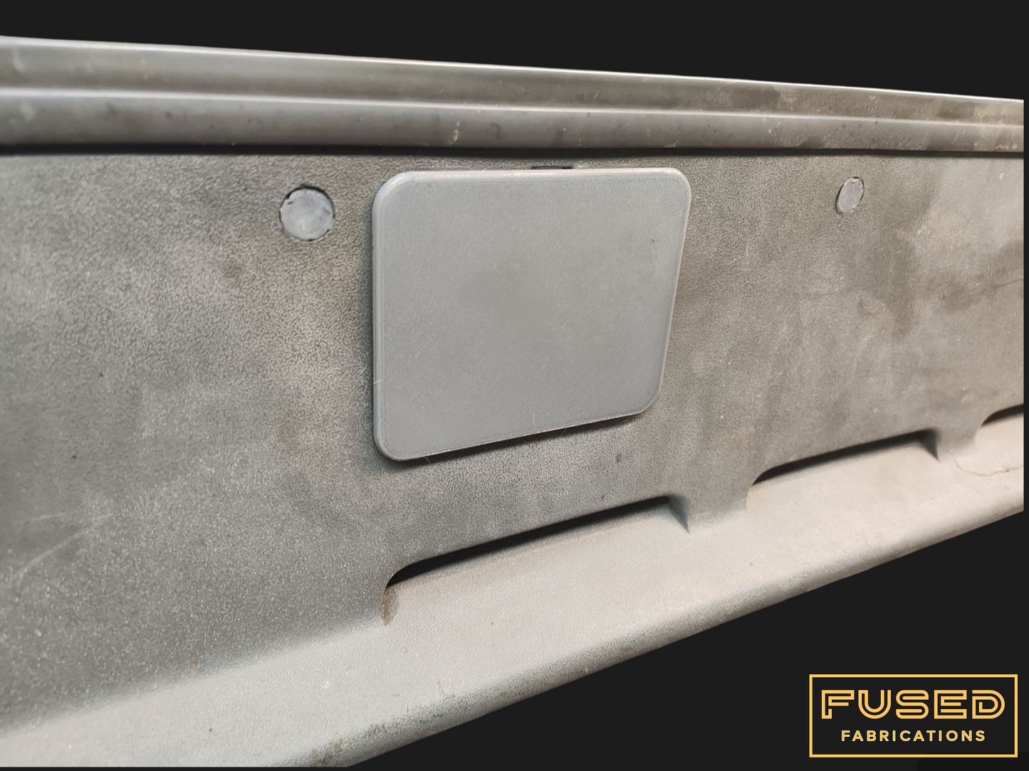 Snow plough tow eye cover